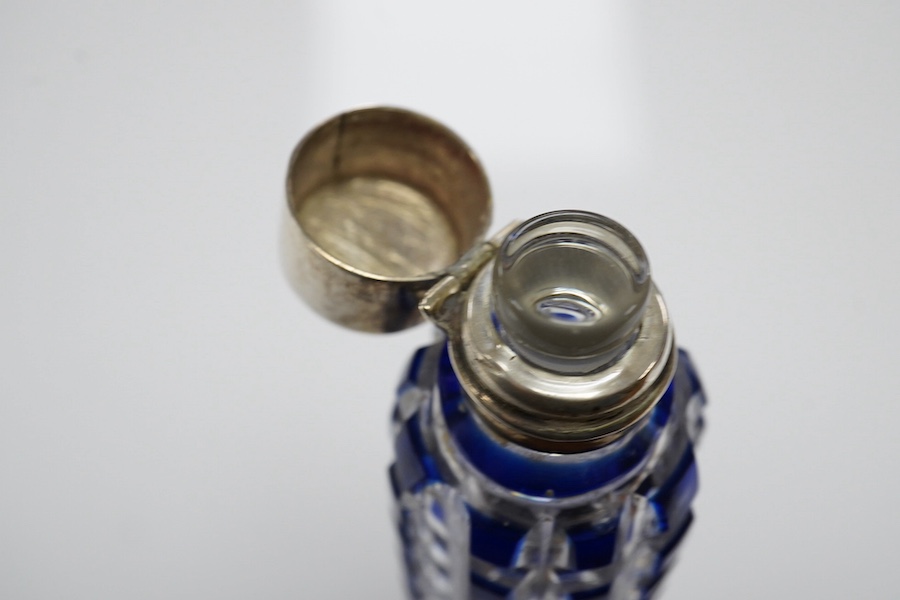 A 19th century blue overlay glass scent bottle with square ribbed design, 12cm long. Condition - good